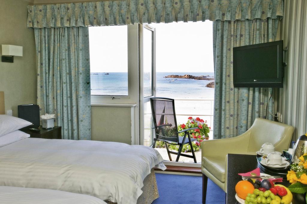 Cobo Bay Hotel Castel Rum bild