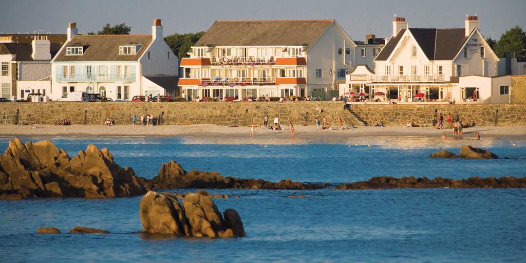 Cobo Bay Hotel Castel Exteriör bild